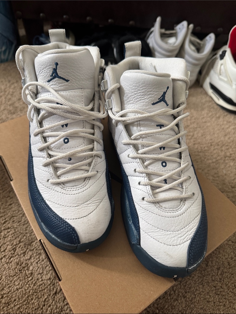 Jordan Boy’s White and Navy Retro Basketball Sneakers
